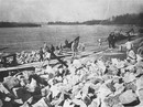 Prisoners of War at Mauthausen, loading stone onto ships on the Danube.